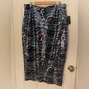 Pencil skirt with slit, new with tags. Perfect for the holiday season!